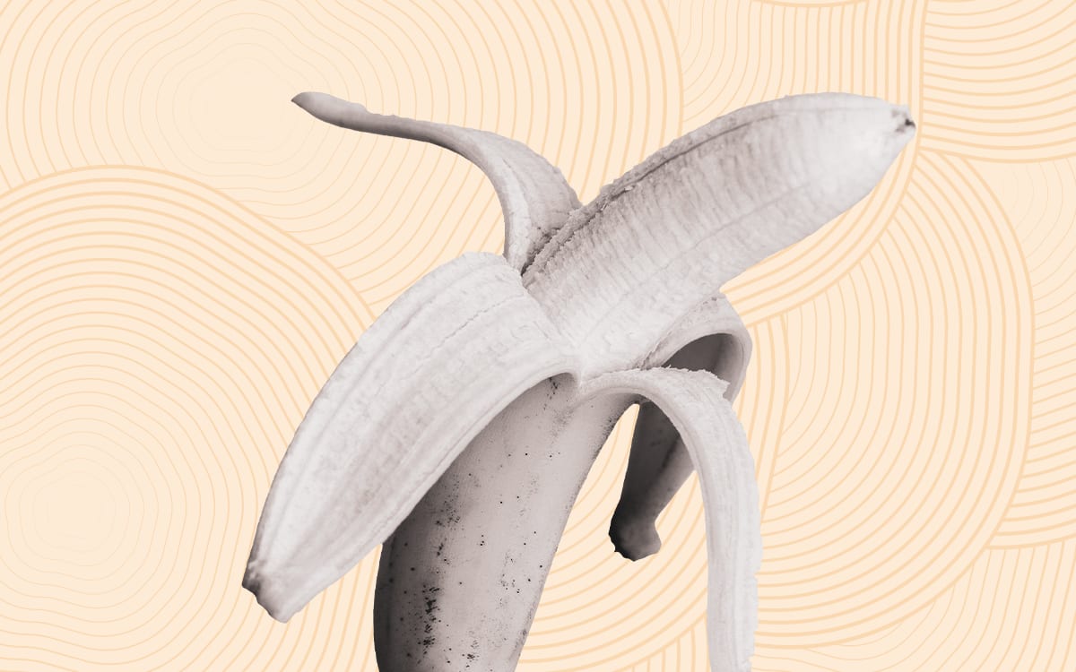 Half peeled banana on a yellow background with circles and lines.